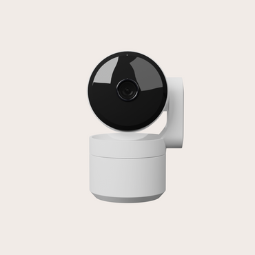 Smart camera with black lens on a white background