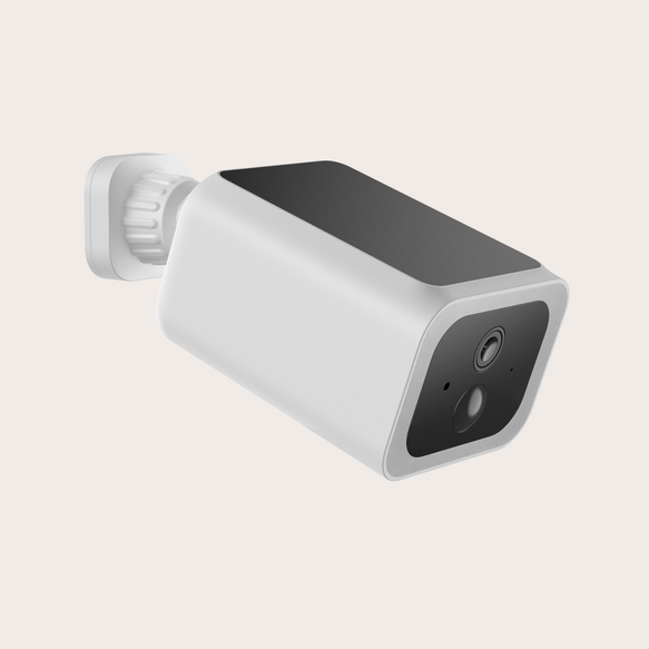 Smart home security camera on a light gray background