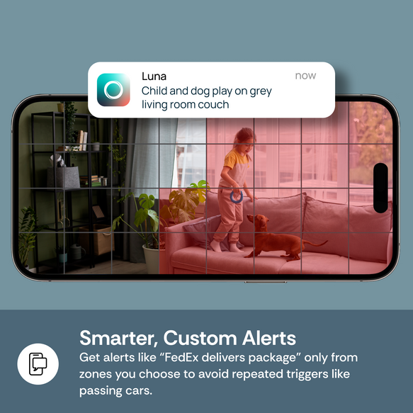 Phone screen showing a child and dog on a couch with a notification about alerts.